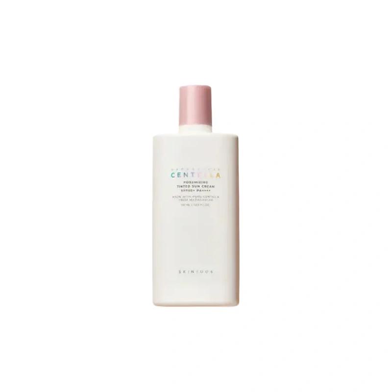 ماداگاسکار سنتلا کوچک کننده منافذ Tinted Sun Cream SPF 50+ اسکین۱۰۰۴ - پوستیتو